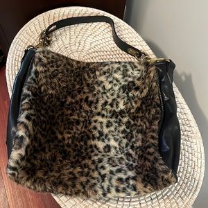 Leather and leopard fur handbag